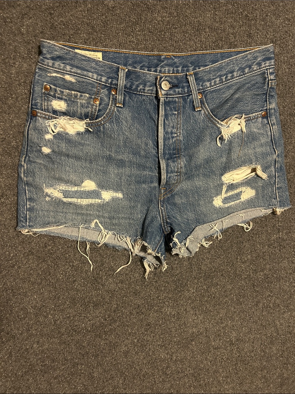 Levi's Distressed Dark Blue Denim Cutoff Shorts
